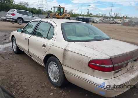 1997 Lincoln Continental from USA, damaged, VIN 1LNLM97V7VY673833